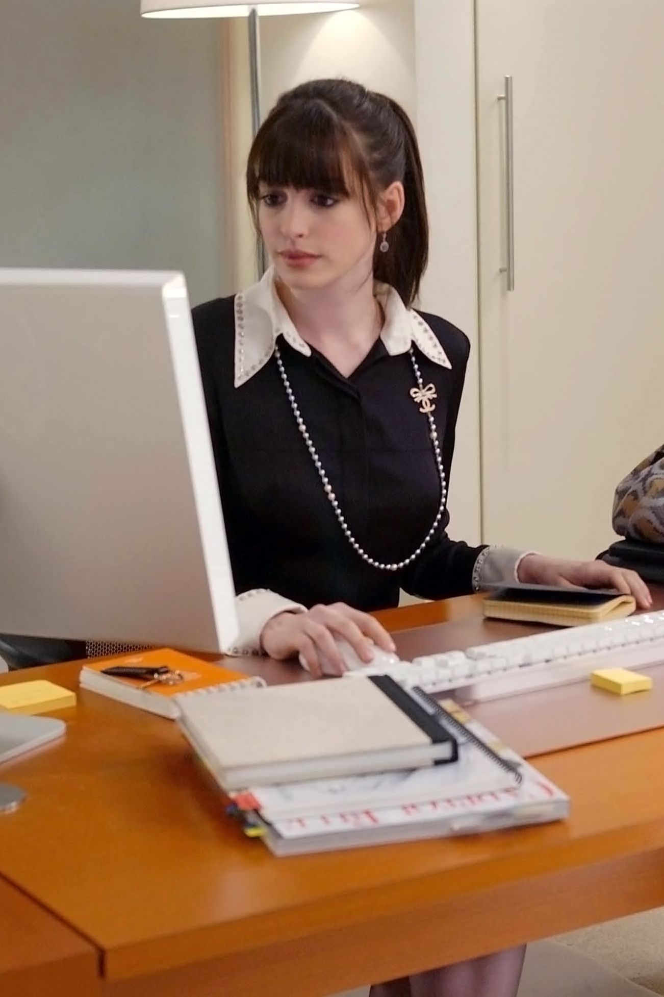 Images may contain Anne Hathaway furniture, tables, books, publications, desks, executive staff, accessories and jewelry