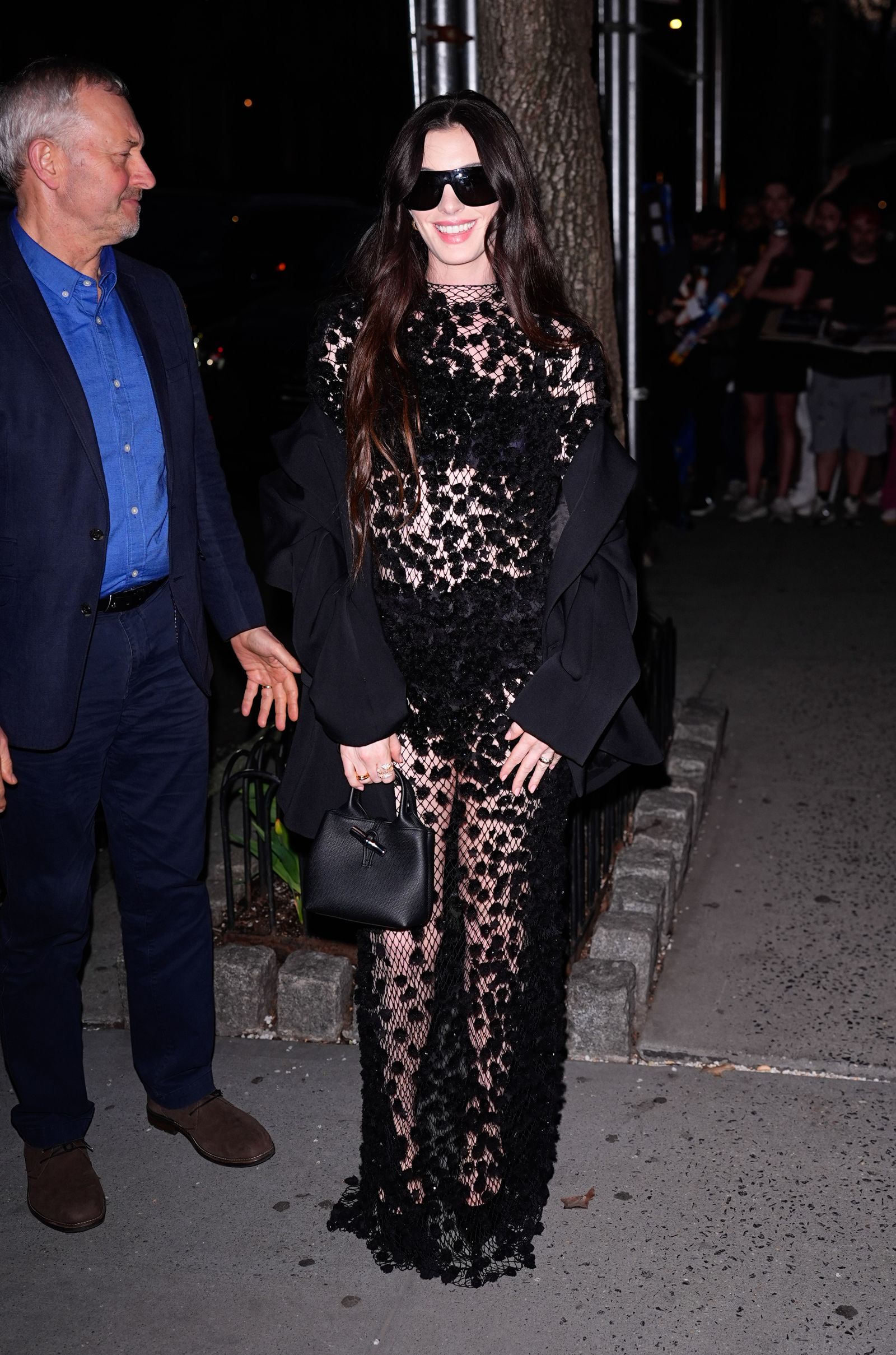 Image may contain Randy Quaid Anne Hathaway Accessories Bags Handbags Fashion Adult Clothing and Dresses