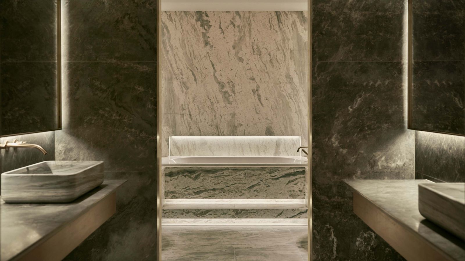 Image may contain sink, sink, faucet, indoor bath, interior design, furniture, bathtub, people and bathtub