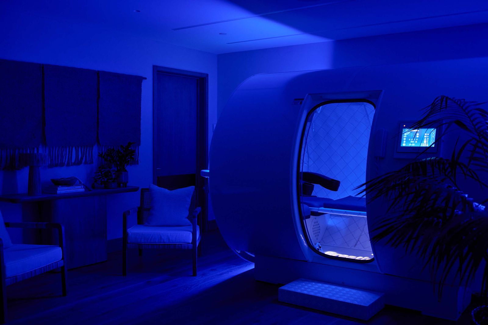 Image may contain lighting, chair, furniture, interior, interior design, architecture, architecture, living room, room and sofa