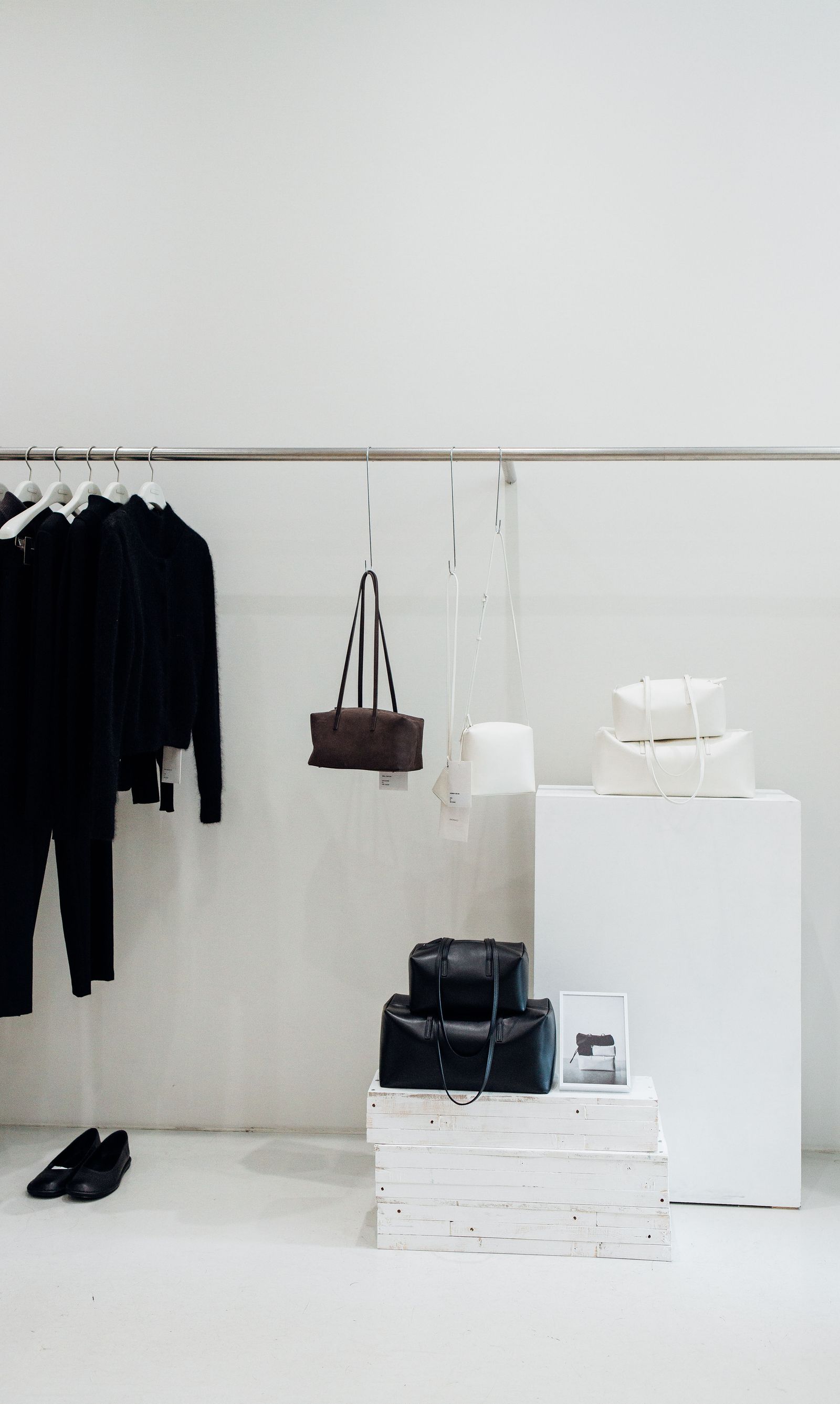 Pictures may contain accessories, bags, handbags, interior dressing rooms, rooms and furniture