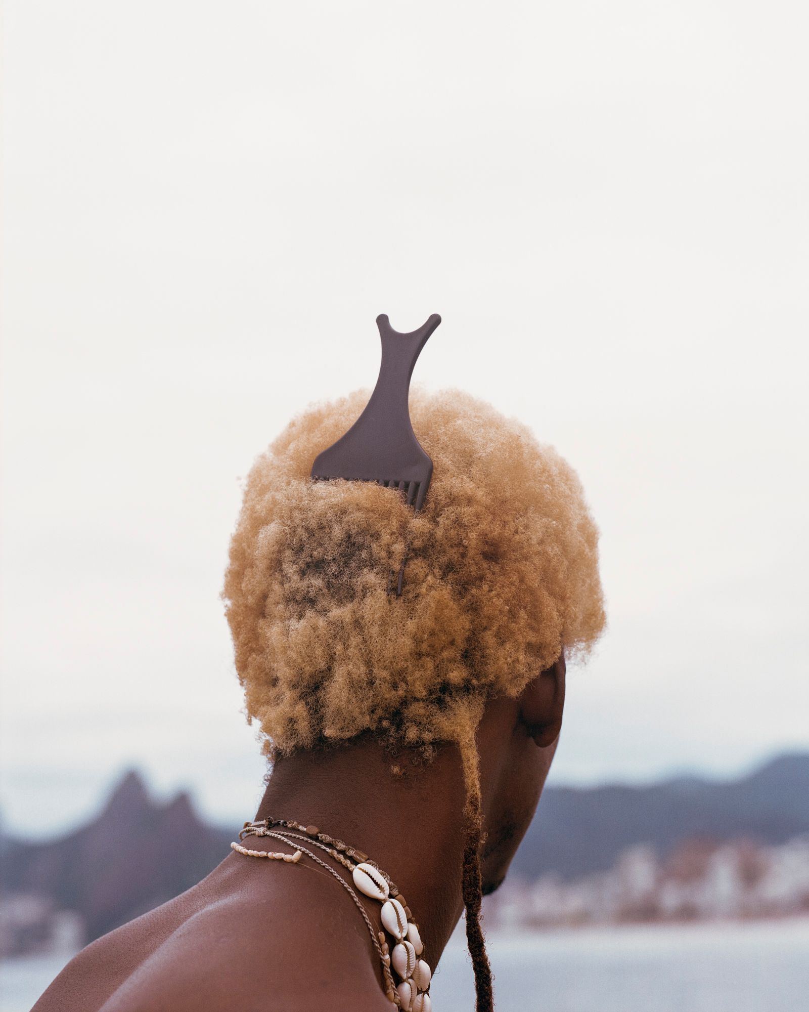 Image may contain adult body parts, shoulders, face, head, neck, blond hair and hair