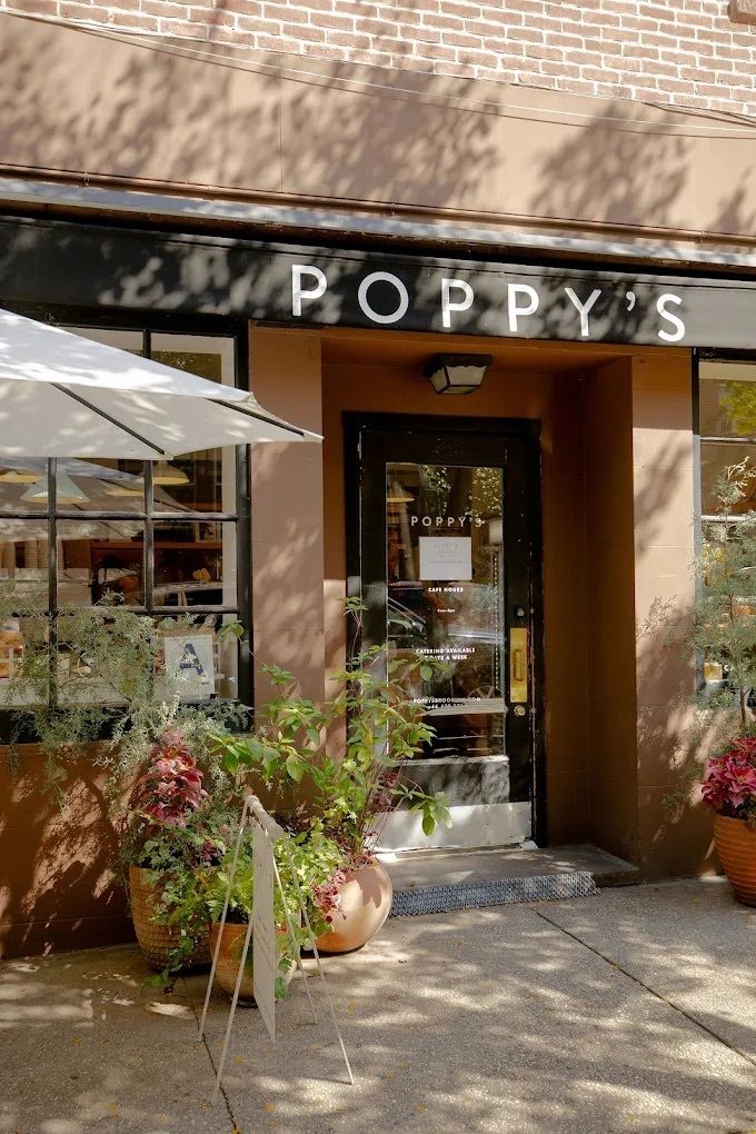 Picture may contain plants, pots, plant lights, cafes, indoor restaurants, jars, flower pots, pottery, vases, city shops and books