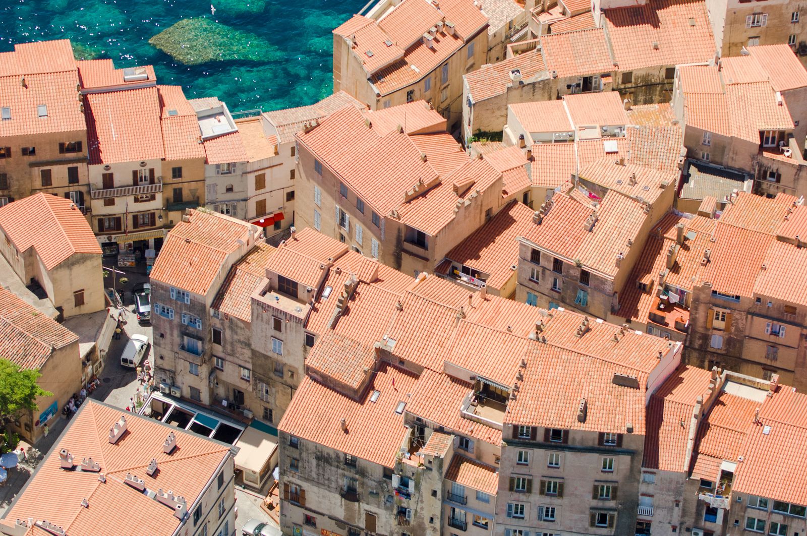 Image may contain building, building, house, roof, tile roof and outdoor