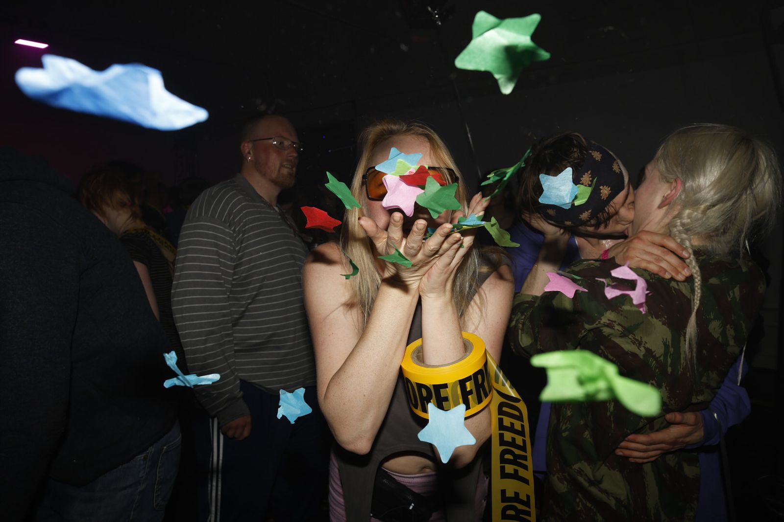 Images may contain faces, heads, people photography, portraits, clothing, adult papers, T-shirts, body parts and fingers