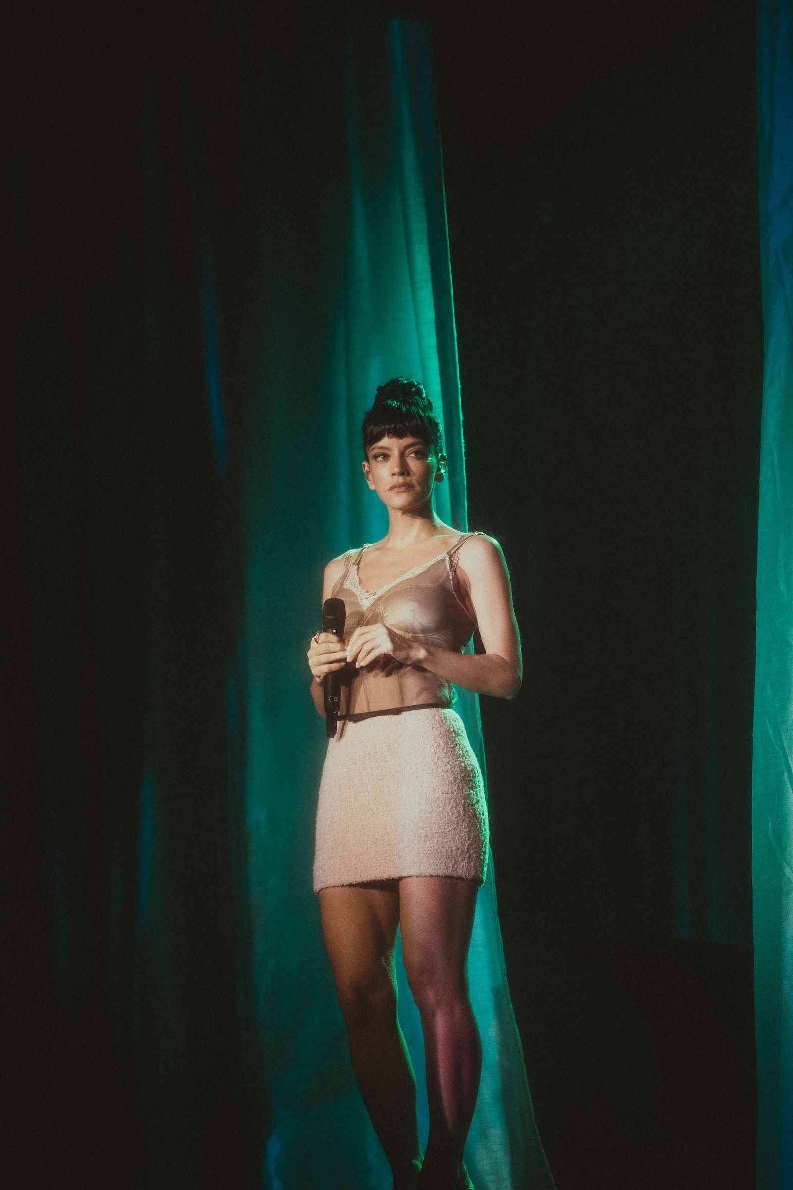 Image may contain Lily Allen Face Happy Head Person Smile Adult Costume Sleeves Performer and Solo Performance