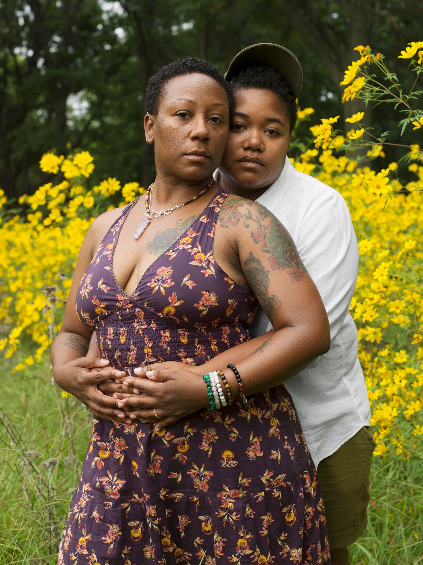 Image may contain faces, heads, people photography, portraits, plants, vegetation, people, shirts, clothing, adults and skin