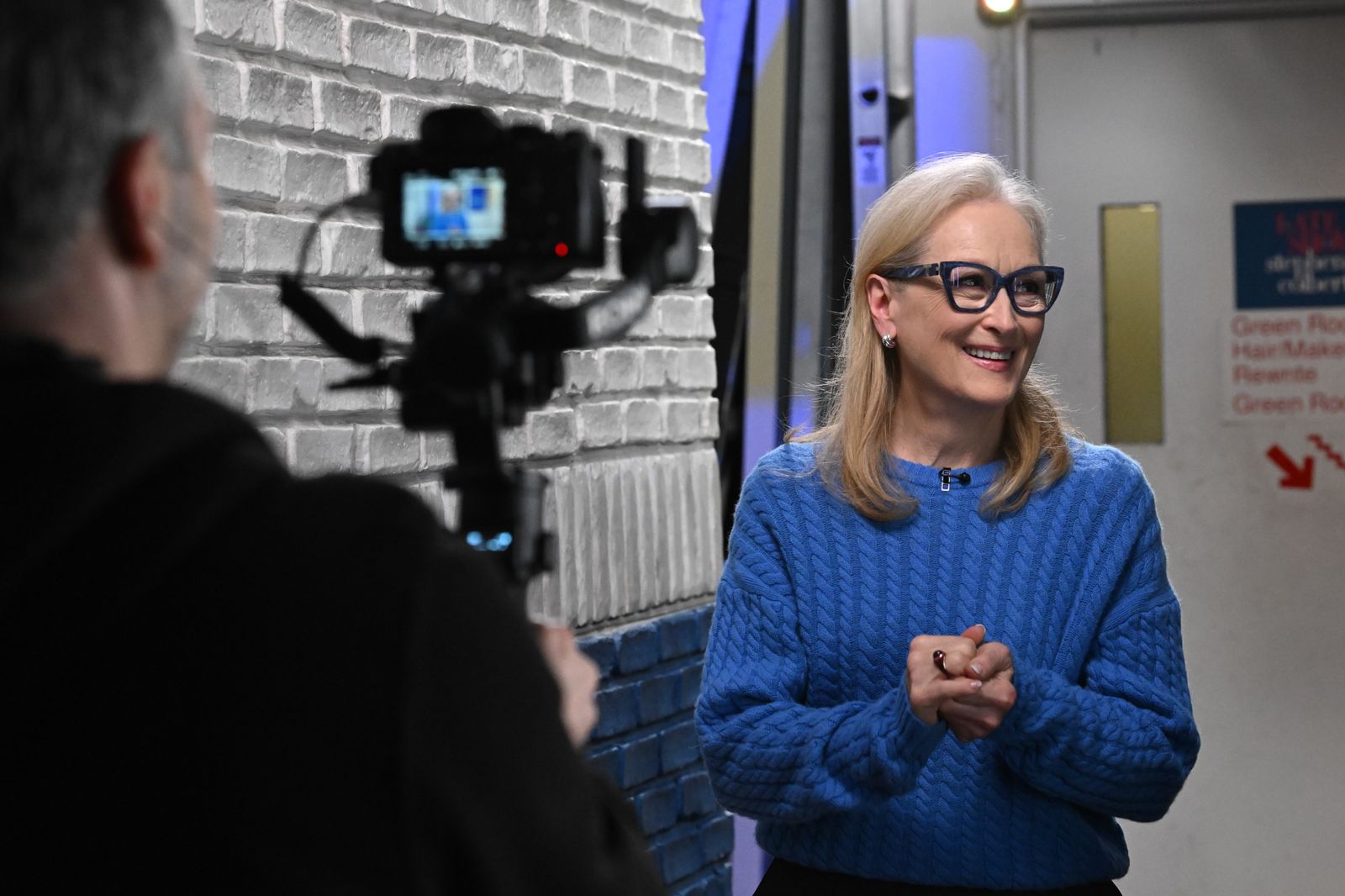 Image may contain Meryl Streep cameras, video cameras, adult photography accessories and eyewear