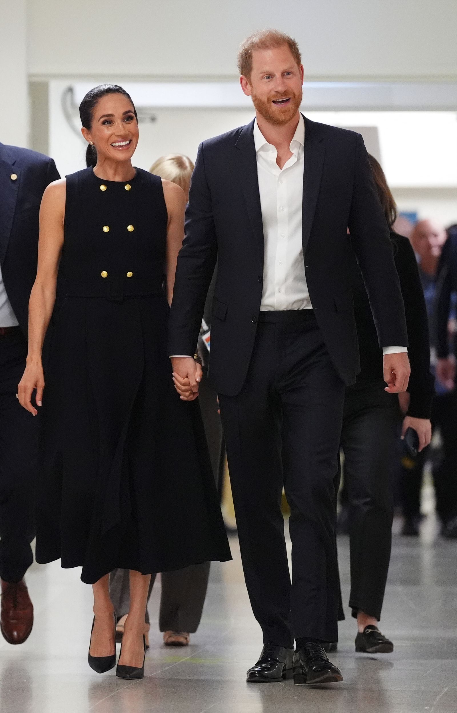 Image may contain Prince Harry, Meghan, Duke of Sussex, Duchess of Sussex blazers, coats and people