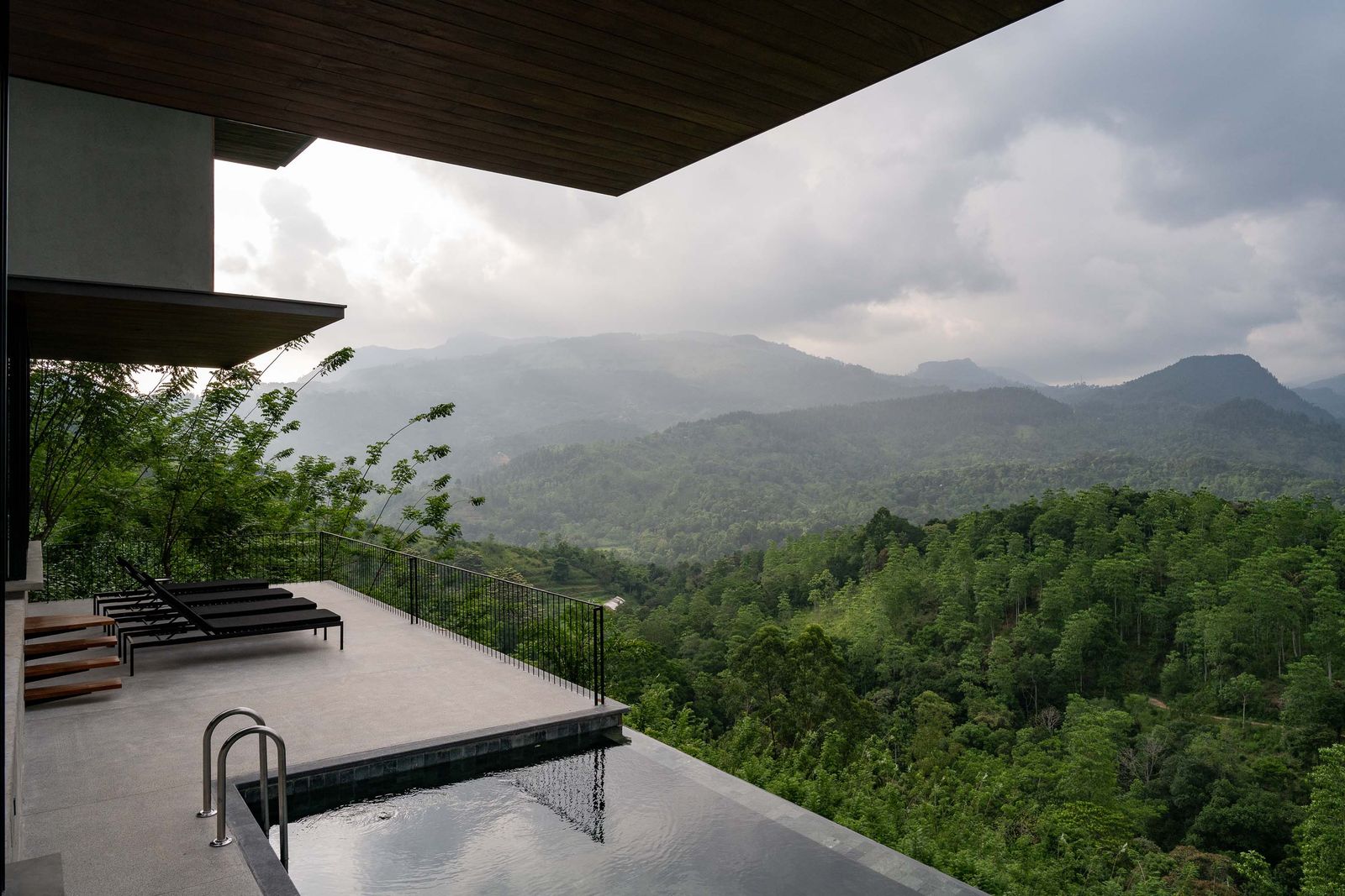 Image may contain plants, vegetation, trees, land, nature, outdoors, rainforest, woodland, landscape, architecture and architecture