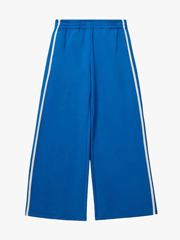 Image may contain: clothes, shorts, skirt and swimming trunks