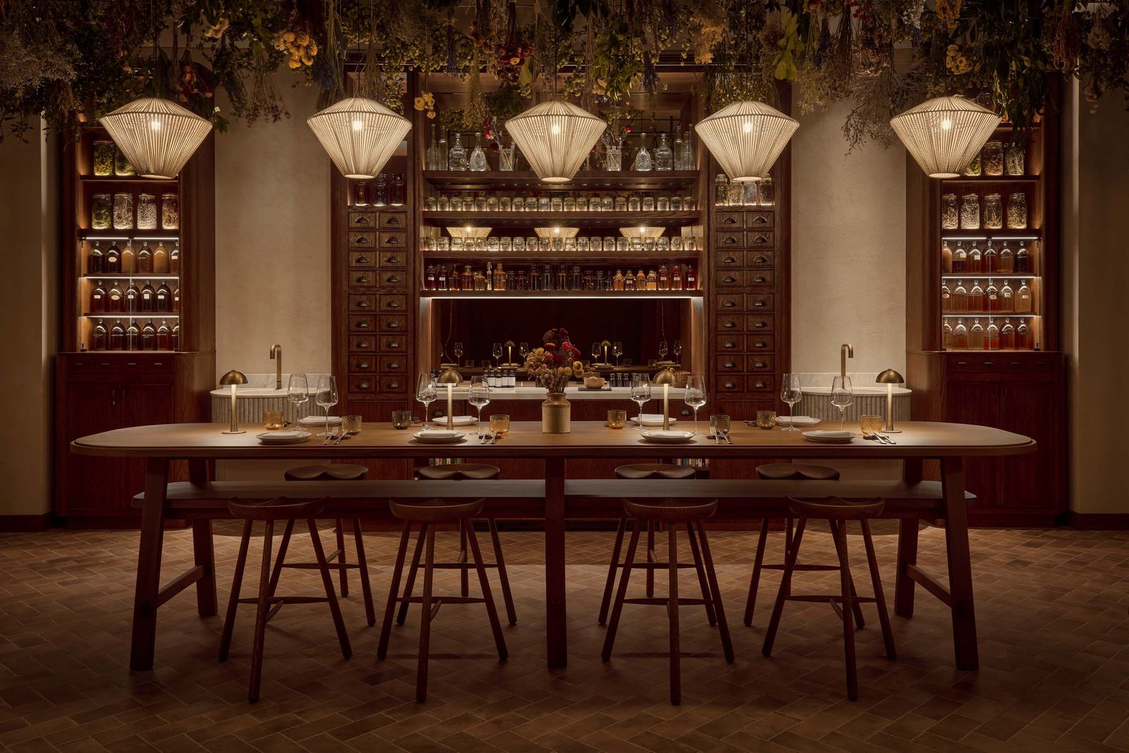 Image may contain cups, bars, chairs, furniture, plates and lights