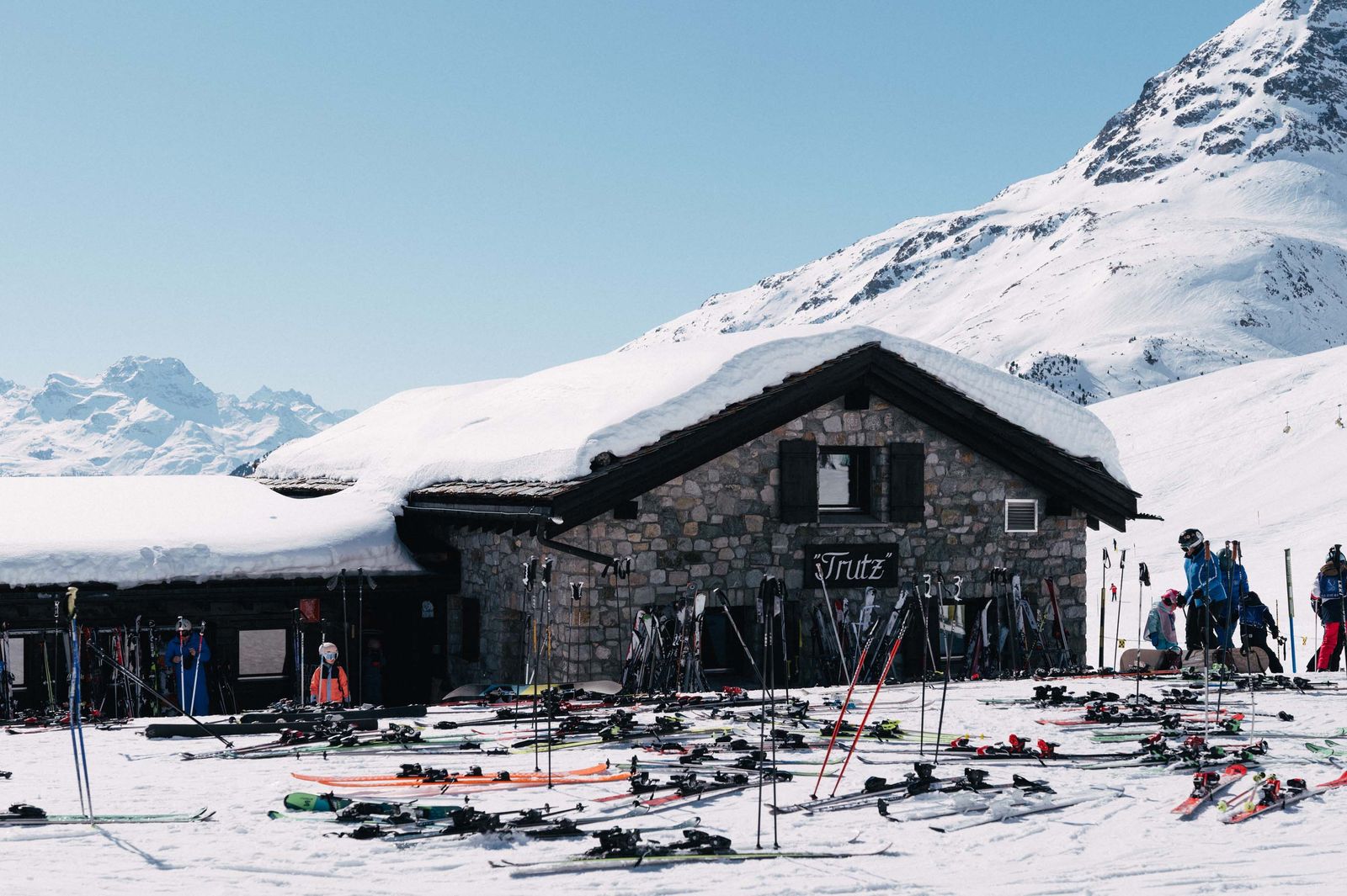 Image may contain building, architecture, outdoor, shelter, nature, snow, people, leisure activities, skiing and sports