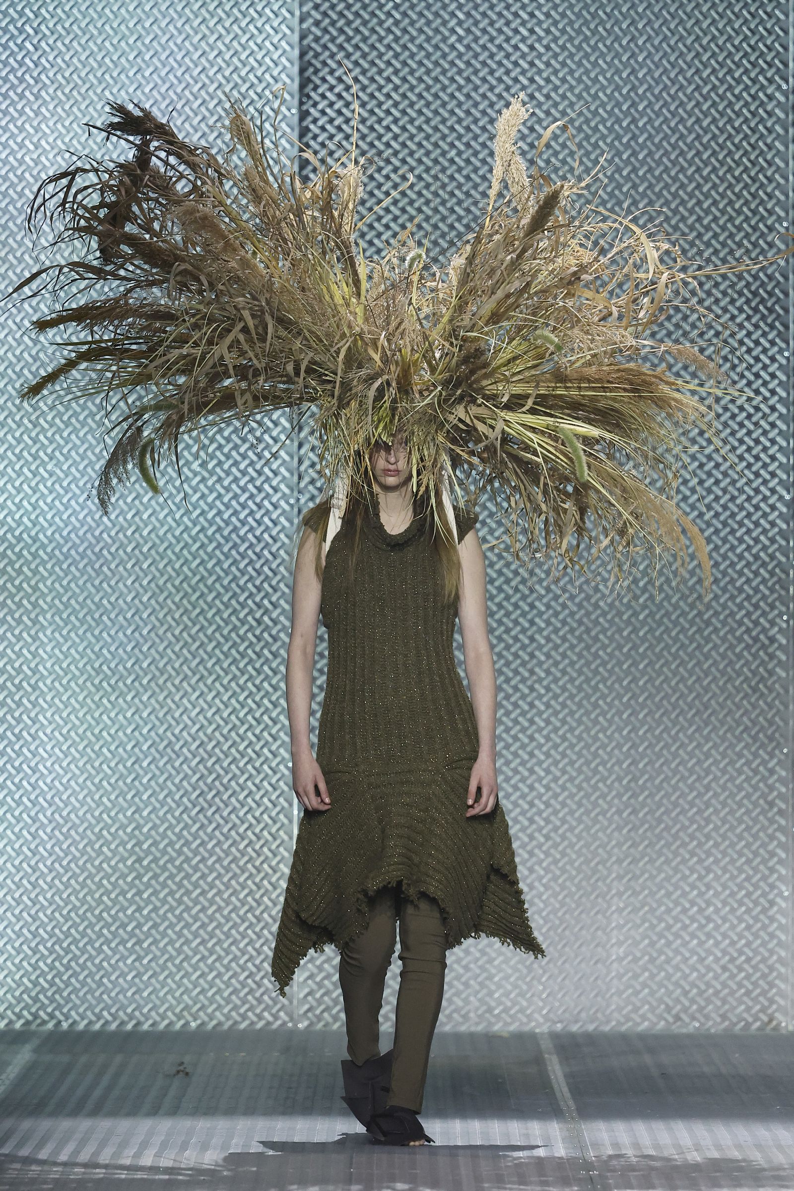 Image may contain adult country nature outdoor straw and plants