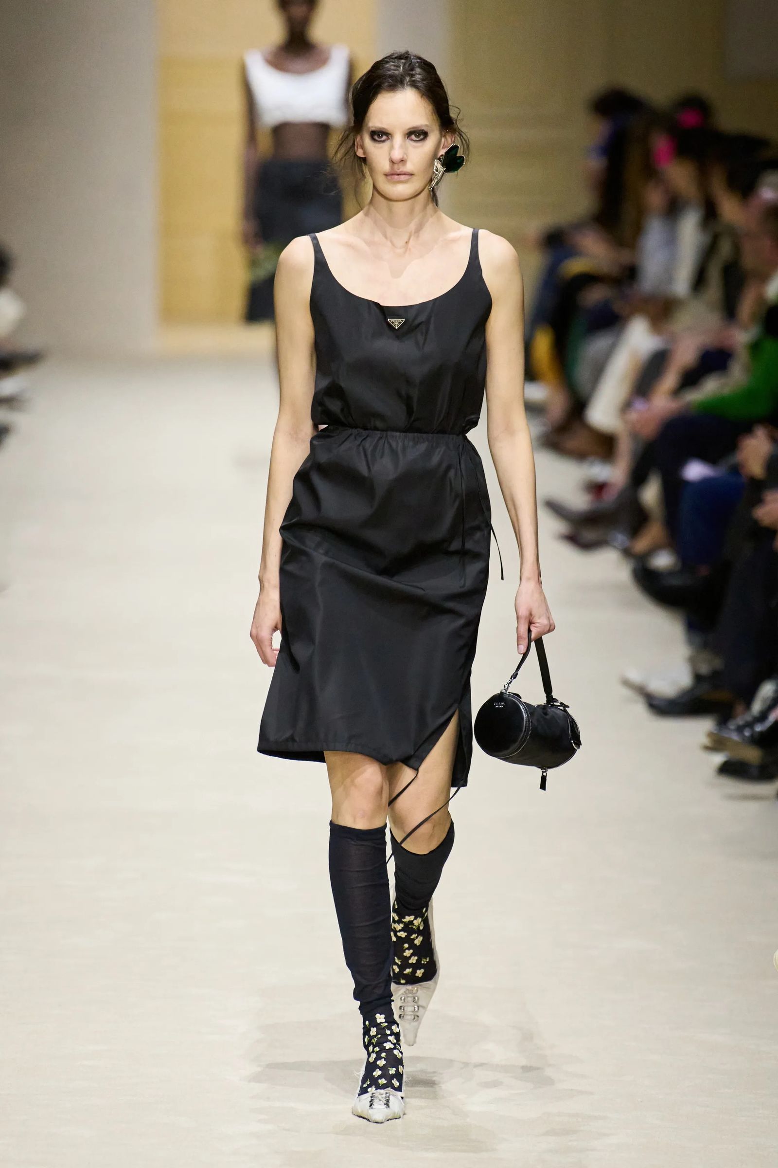 Image may contain adult fashion apparel and runway