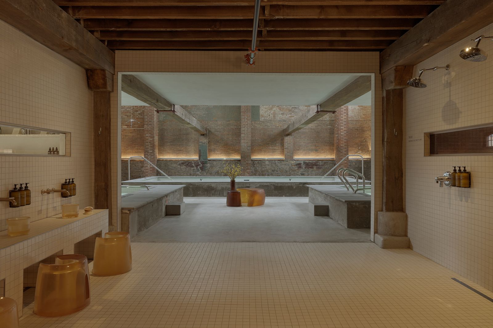 Pictures may contain floor, floor, bath, interior, interior design, bath, hot tub and plants.