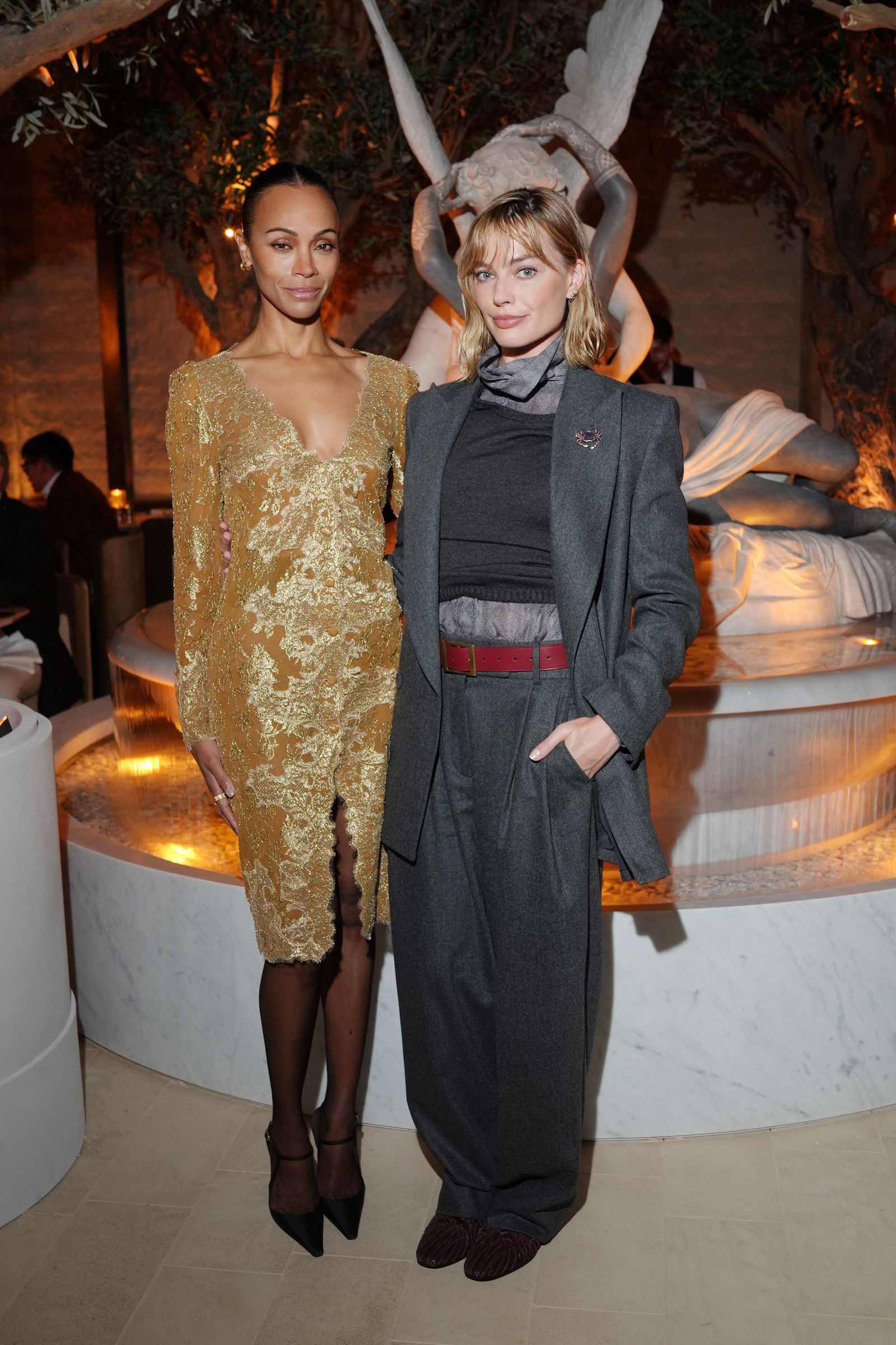 Milan, Italy On April 21, Zoe Saldana and Margot Robbie attended the opening ceremony of RH Milan's The Gallery on Corso Venezia...