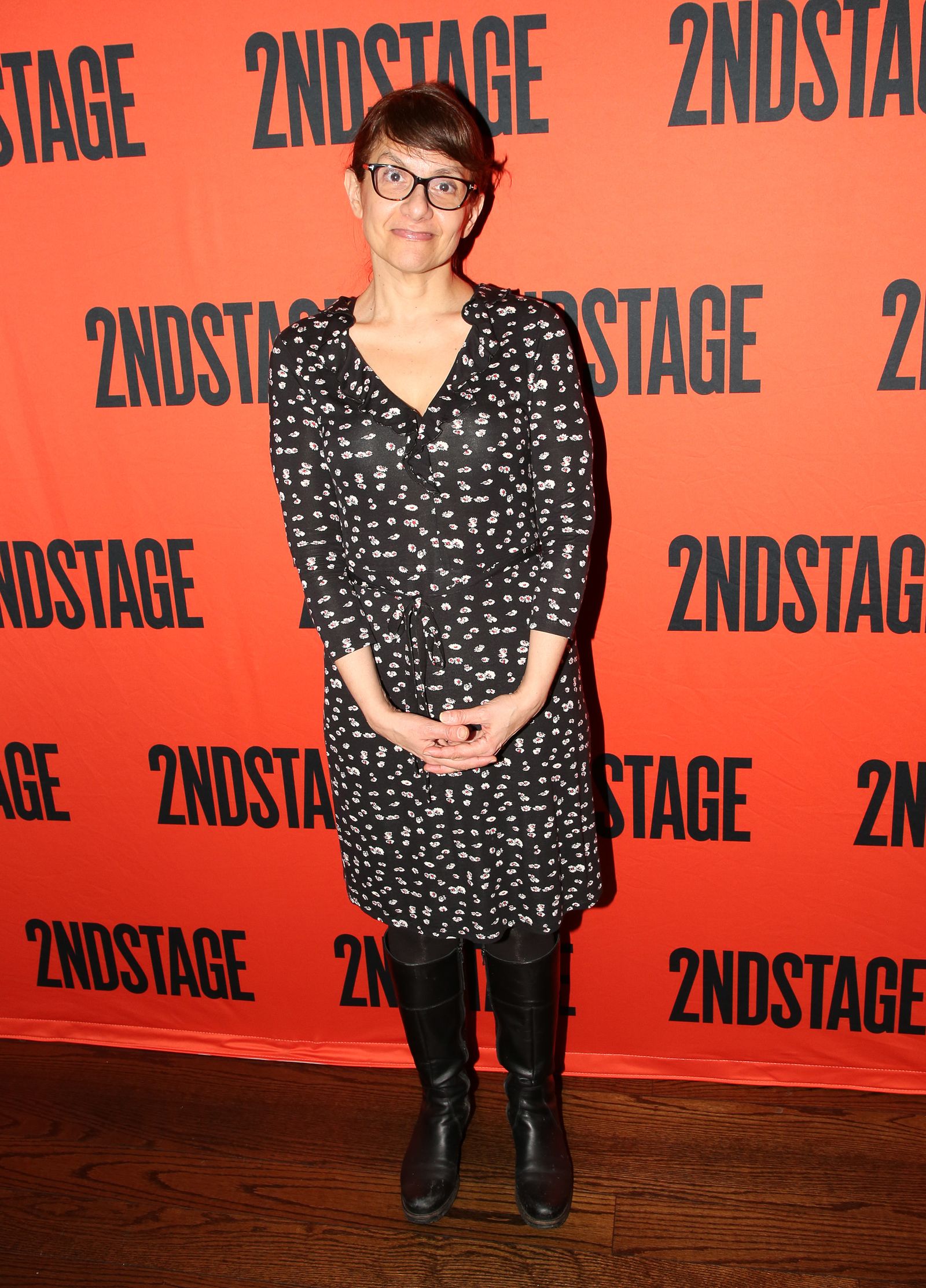 Image may contain Gina Gionfriddo Adult Fashion Standing Clothing Footwear Faces Heads and Shirts