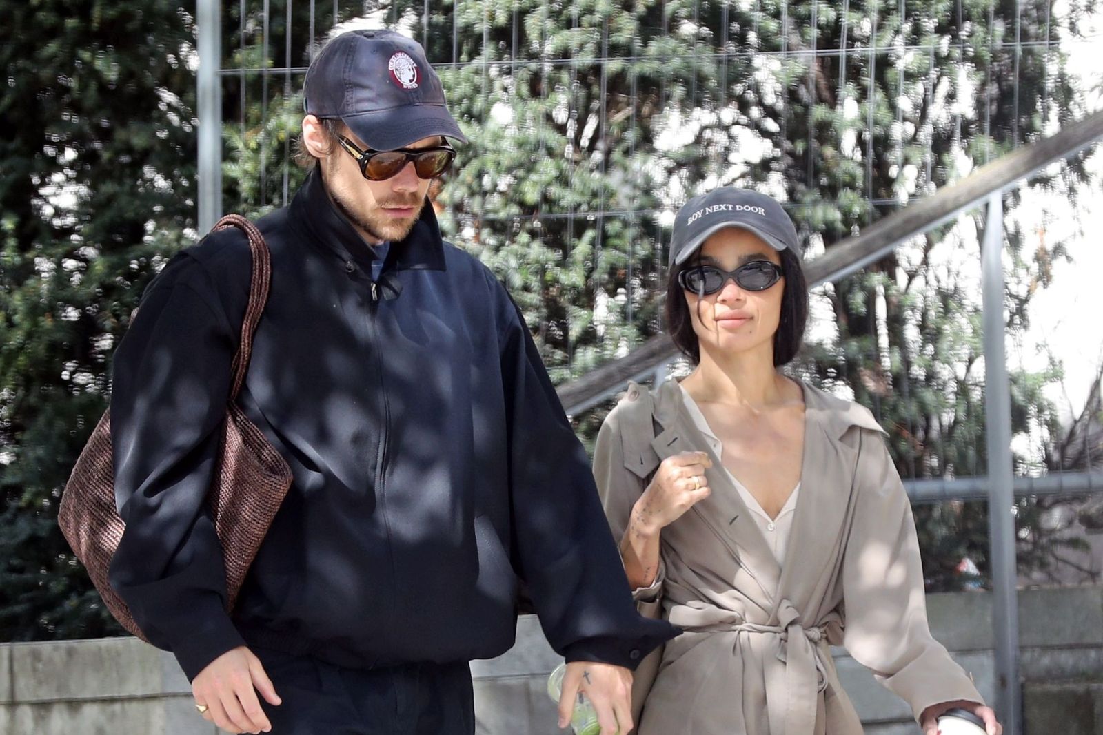 Image may contain Harry Styles Zoë Kravitz adult apparel, hats, accessories, sunglasses and eyewear