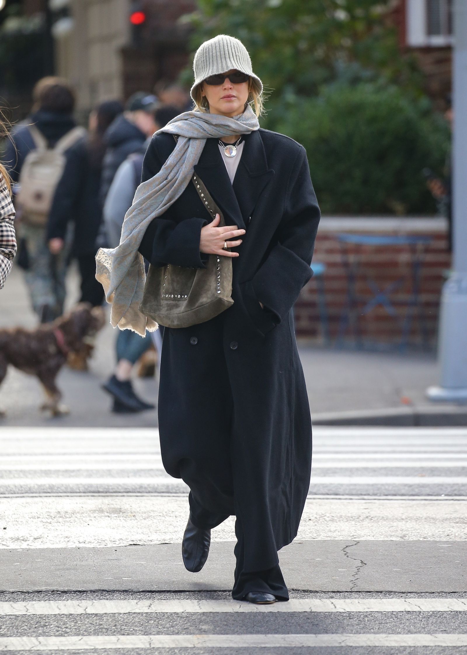 New York New York Actress Jennifer Lawrence was spotted out and about in New York wearing a long black coat paired with…