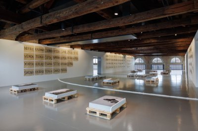View of a several installation works in a historic building in Venice.