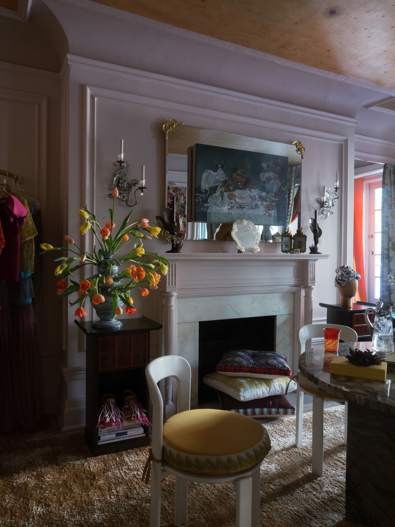 Pictures may contain fireplaces, interior design, chairs, furniture, floral arrangements, plants and home decor