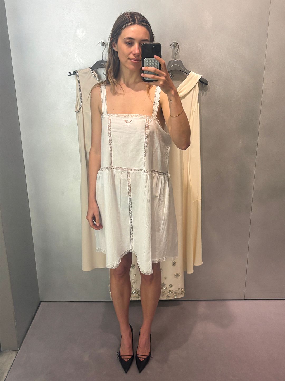 Image may contain adult clothing, sleeves and dresses