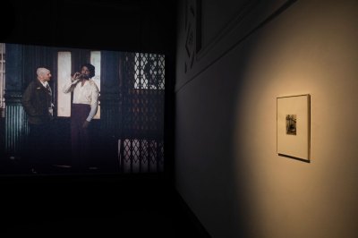 A still of a remake of 'Taxi Driver' at left and a photograph at right. 