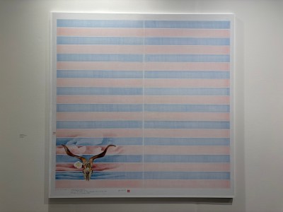There is a painting of a ram's head on the purple and blue stripes.