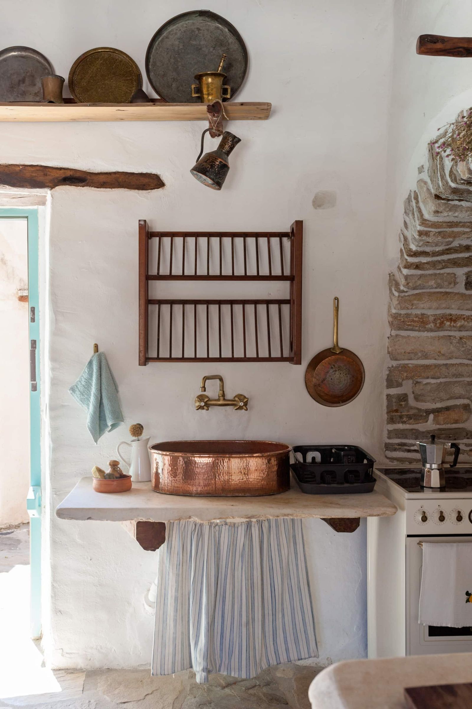 Image may contain sink, crib furniture, crib, cooking pots, cooking utensils, food pots and sink faucets