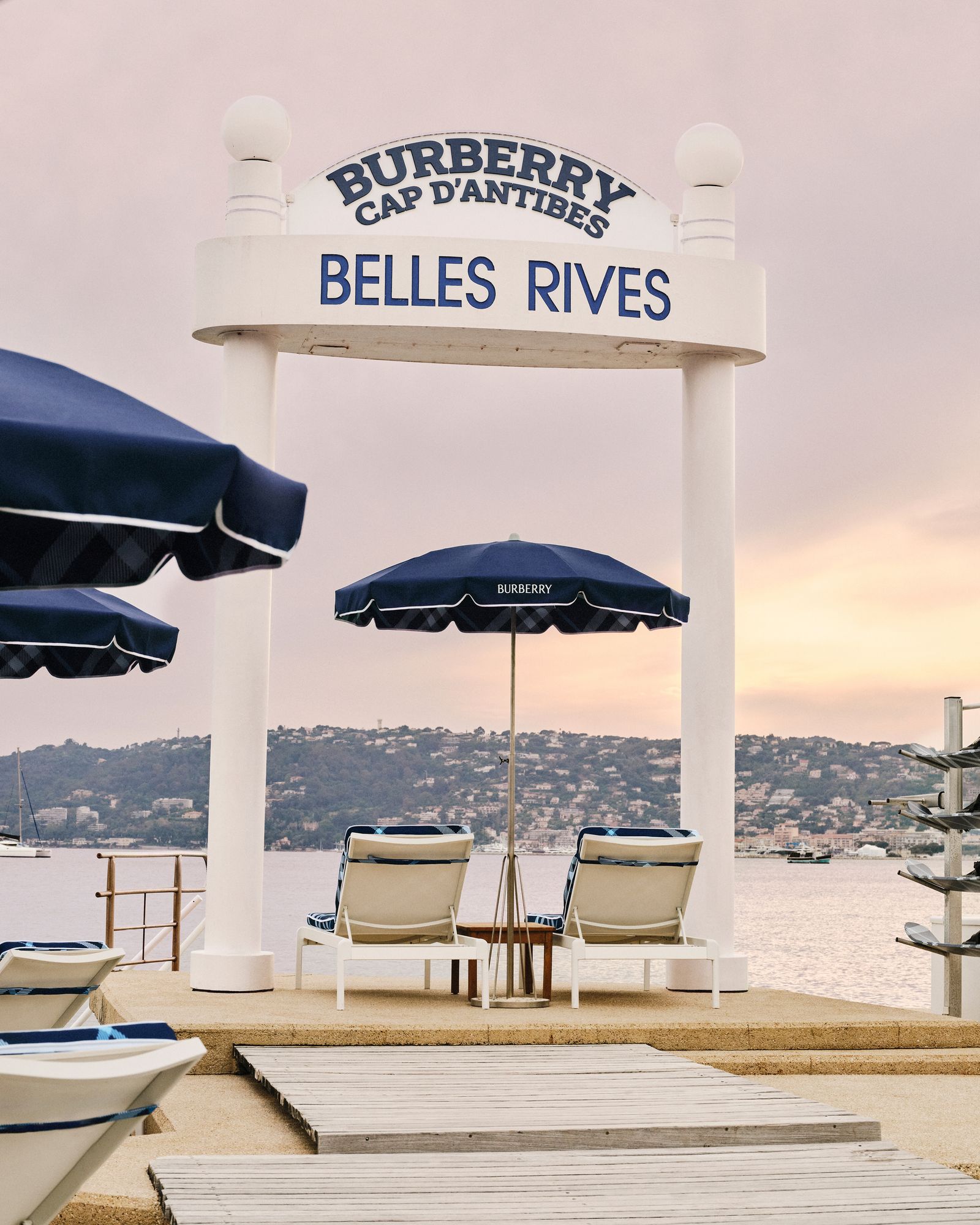 Pictures may contain water, waterfront architecture, architecture, outdoor shelters, chairs, furniture, boats, and transportation