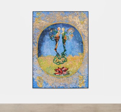 A mosaic artwork showing two oval-shaped figures. 