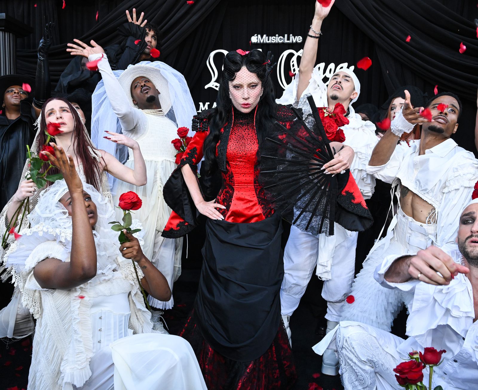 Image may contain Lady Gaga Adult Wedding Face Flower Plant Rose Festival and Halloween
