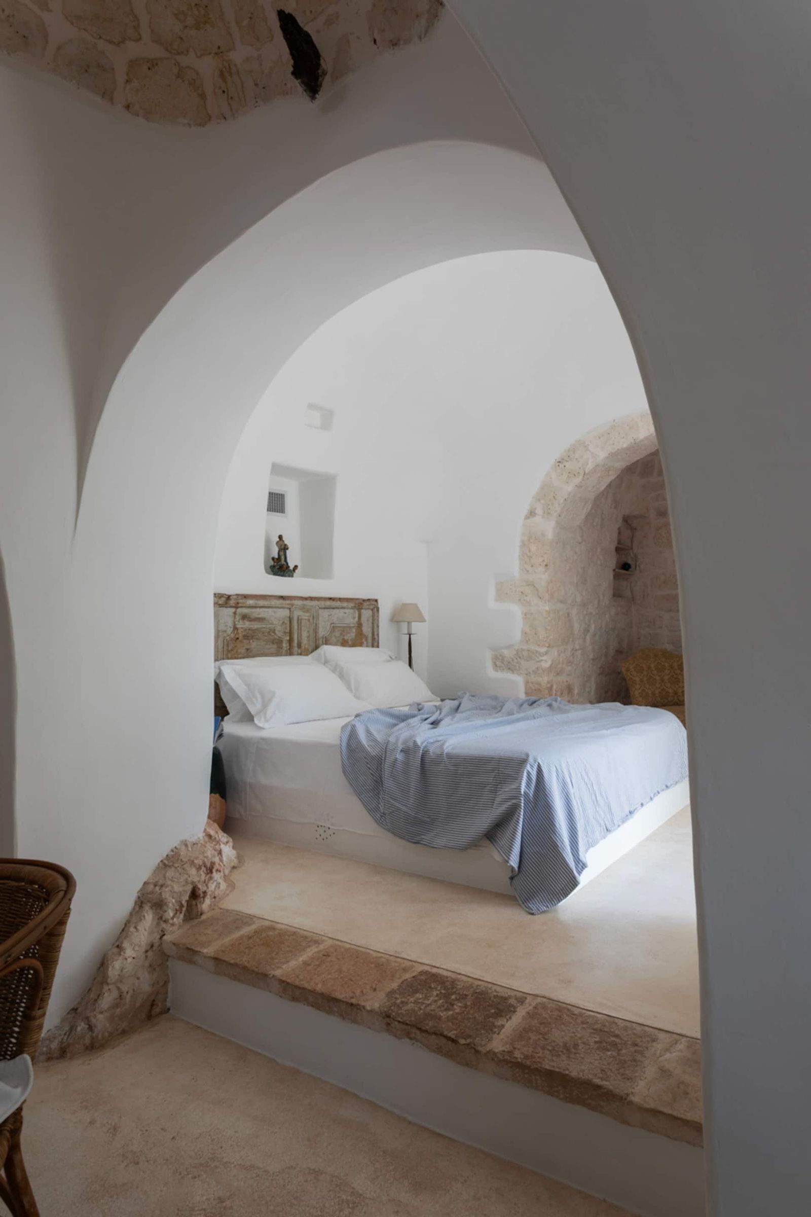 Picture may contain bed furniture arches architecture home decoration lights interior interior design people bedrooms and rooms