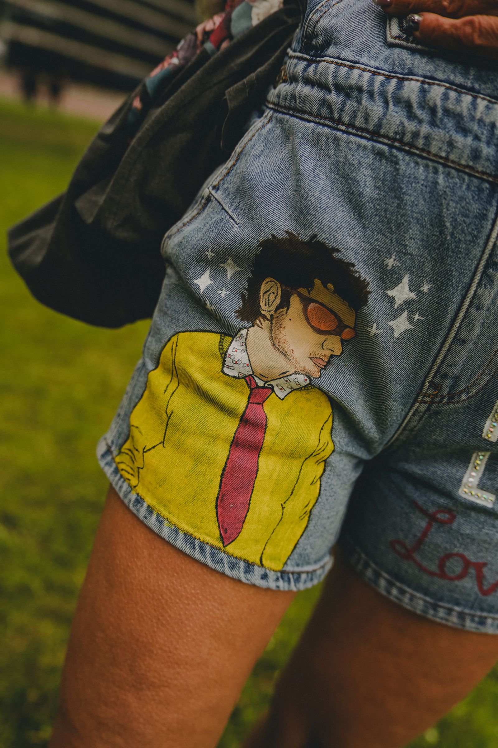 Image may contain clothing, shorts, faces and heads