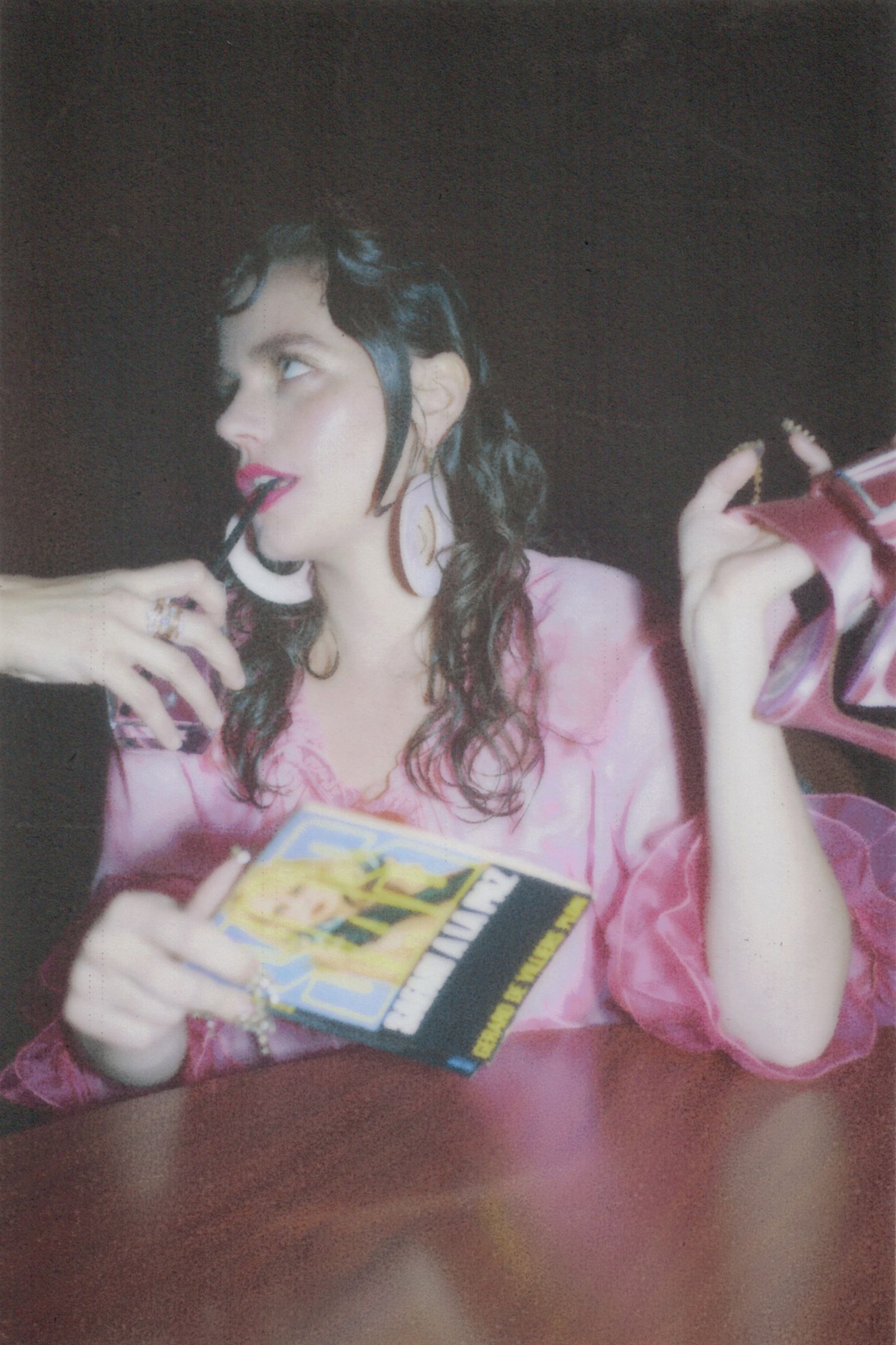 Images may contain faces, heads, people photography, portraits, books, publications, accessories, earrings and jewelry