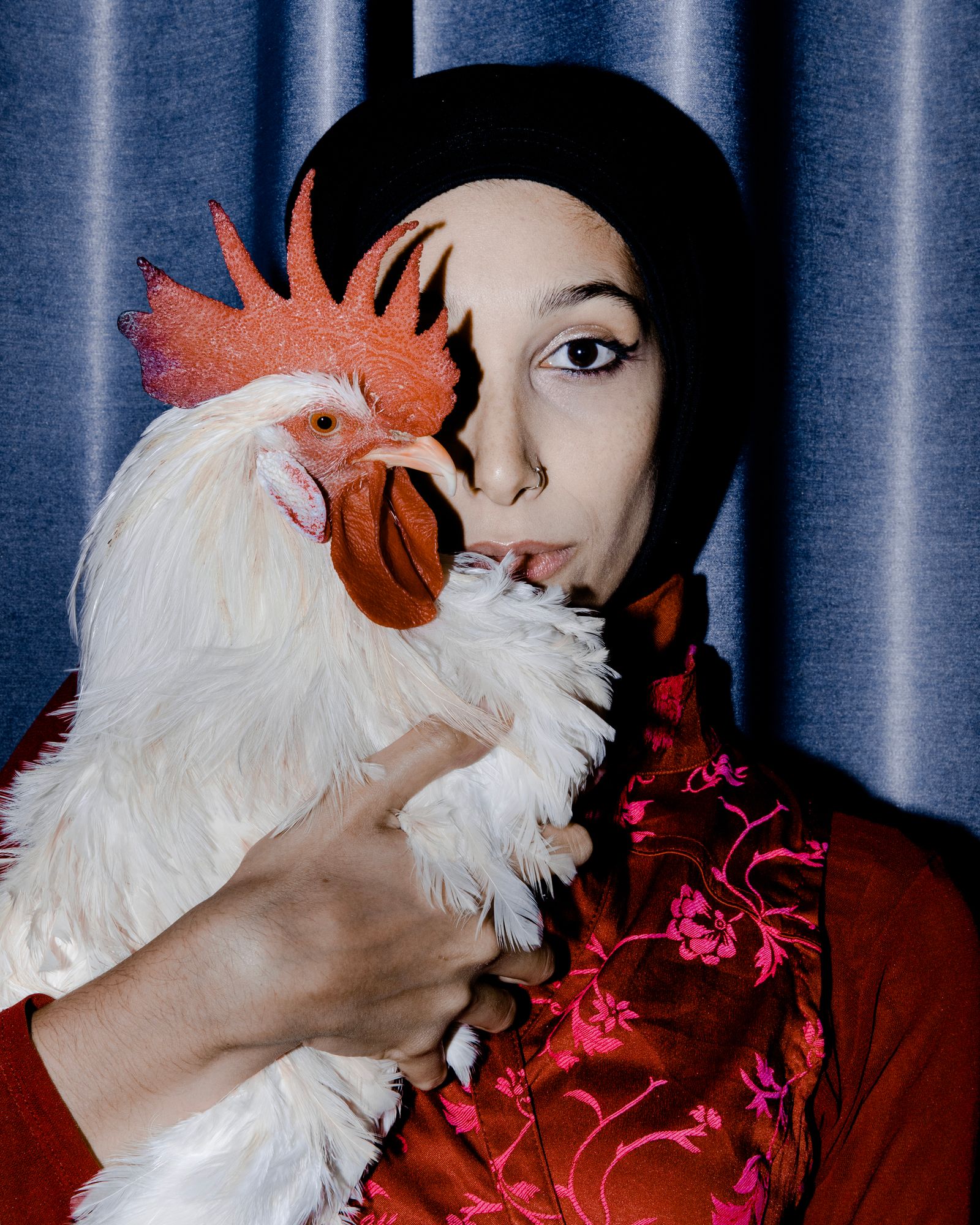 Image may contain Emily Atef adult faces, head photography, animals and birds