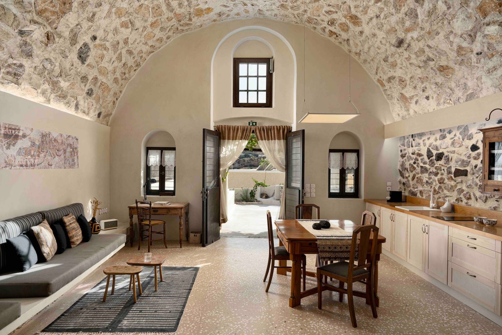 Image may contain floor, table, furniture, table, dining table, building, architecture, restaurant, interior room and chairs