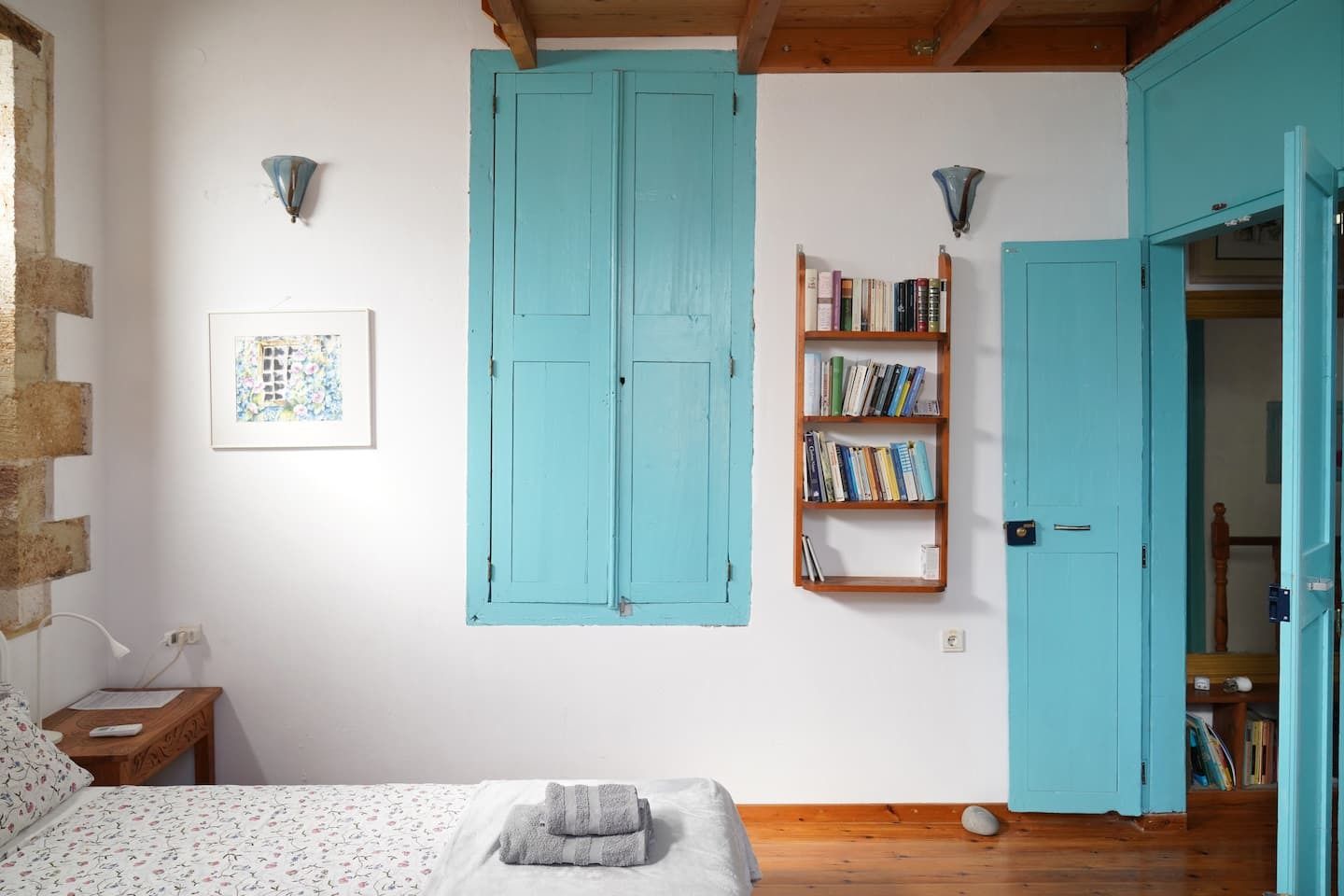 Pictures may contain interior interior design furniture hardwood stained wood wood lamps art paintings and bookcases