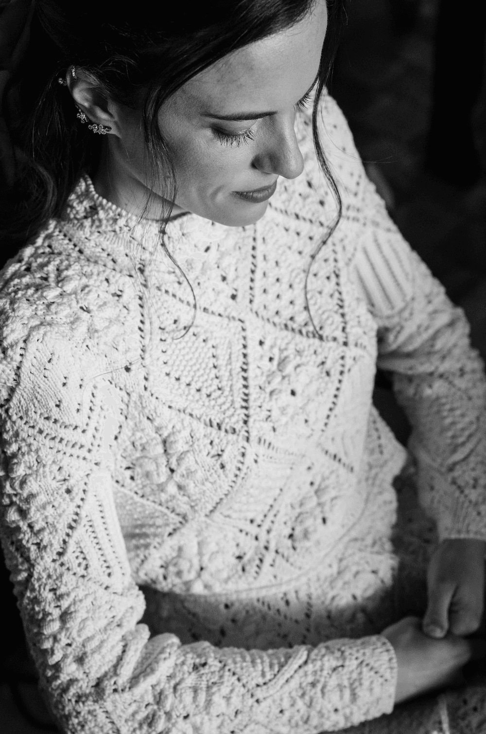 Image may contain clothing, knitwear, sweaters, adult faces and heads