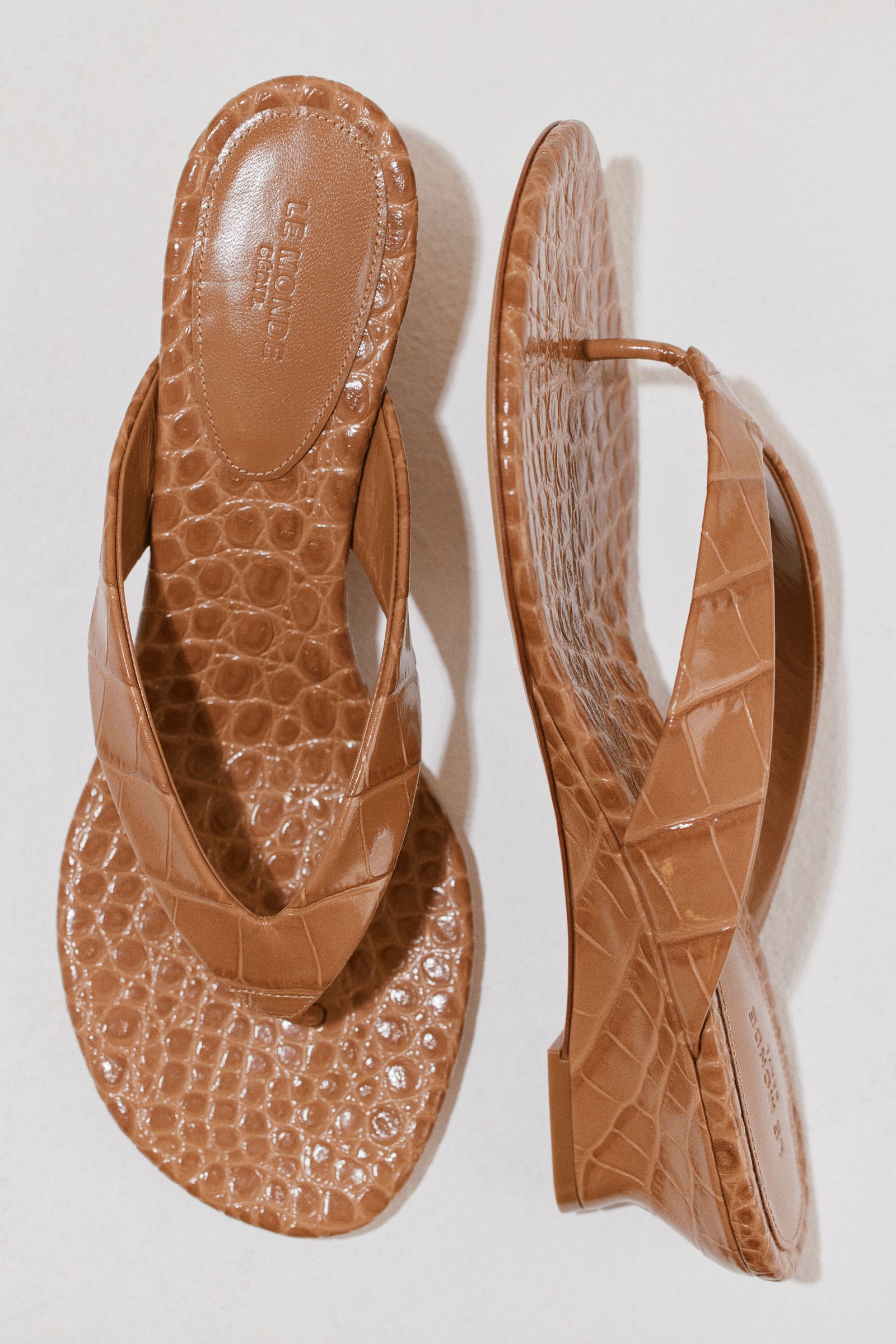 Image may contain clothing, footwear, sandals and shoes