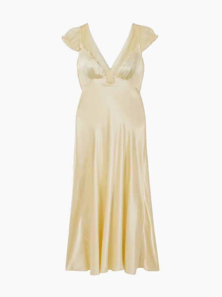 Image may contain: clothing, dress, formal wear, fashion, gown, wedding, wedding dress, evening dress and shirt