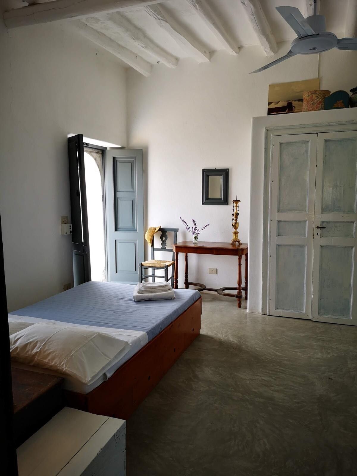 Image may contain flooring, table, furniture, table, corner chair, bed, building, construction, housing and appliances