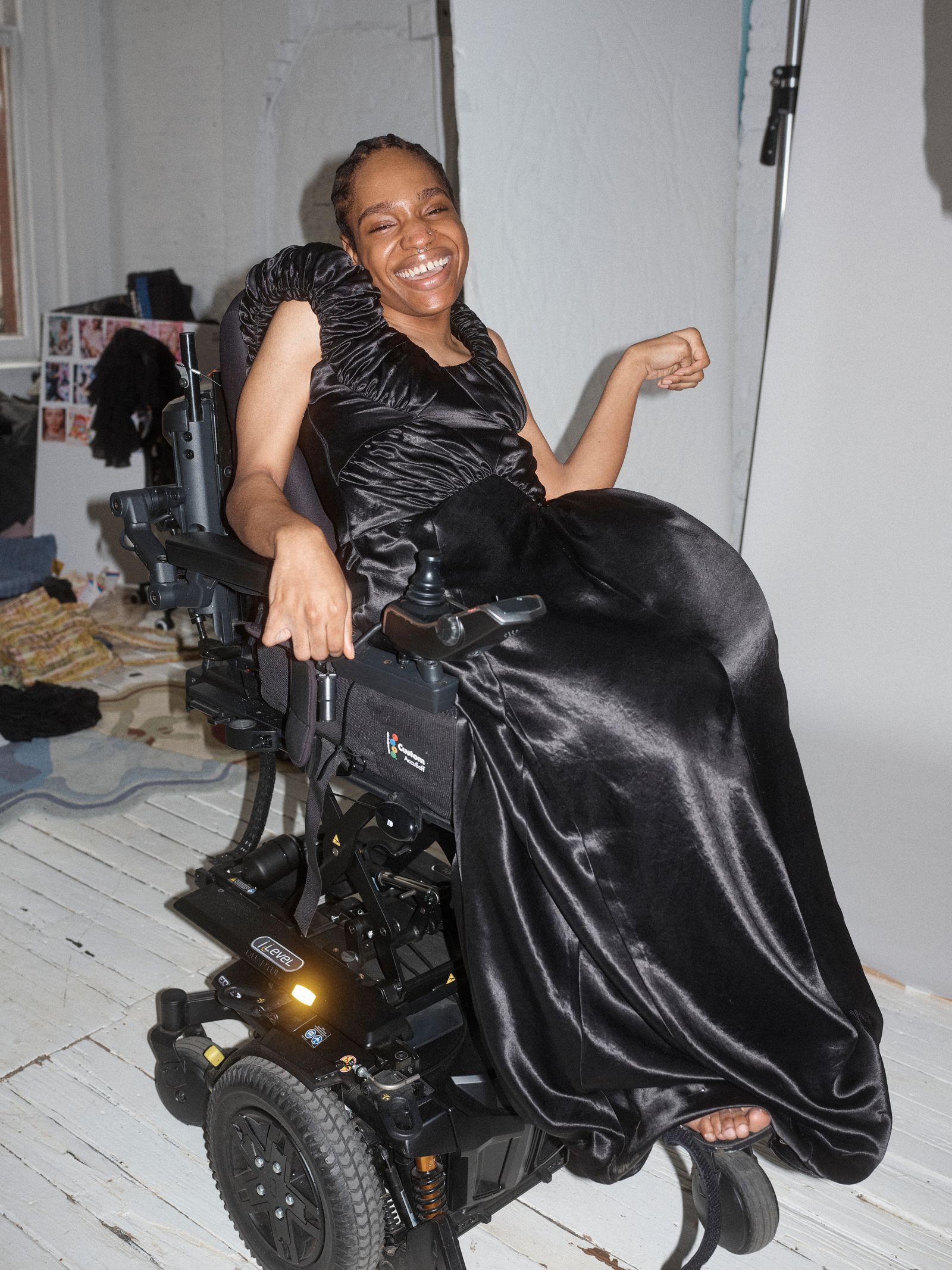 Image may contain furniture, chairs, adult scooters, transportation vehicles and wheelchairs