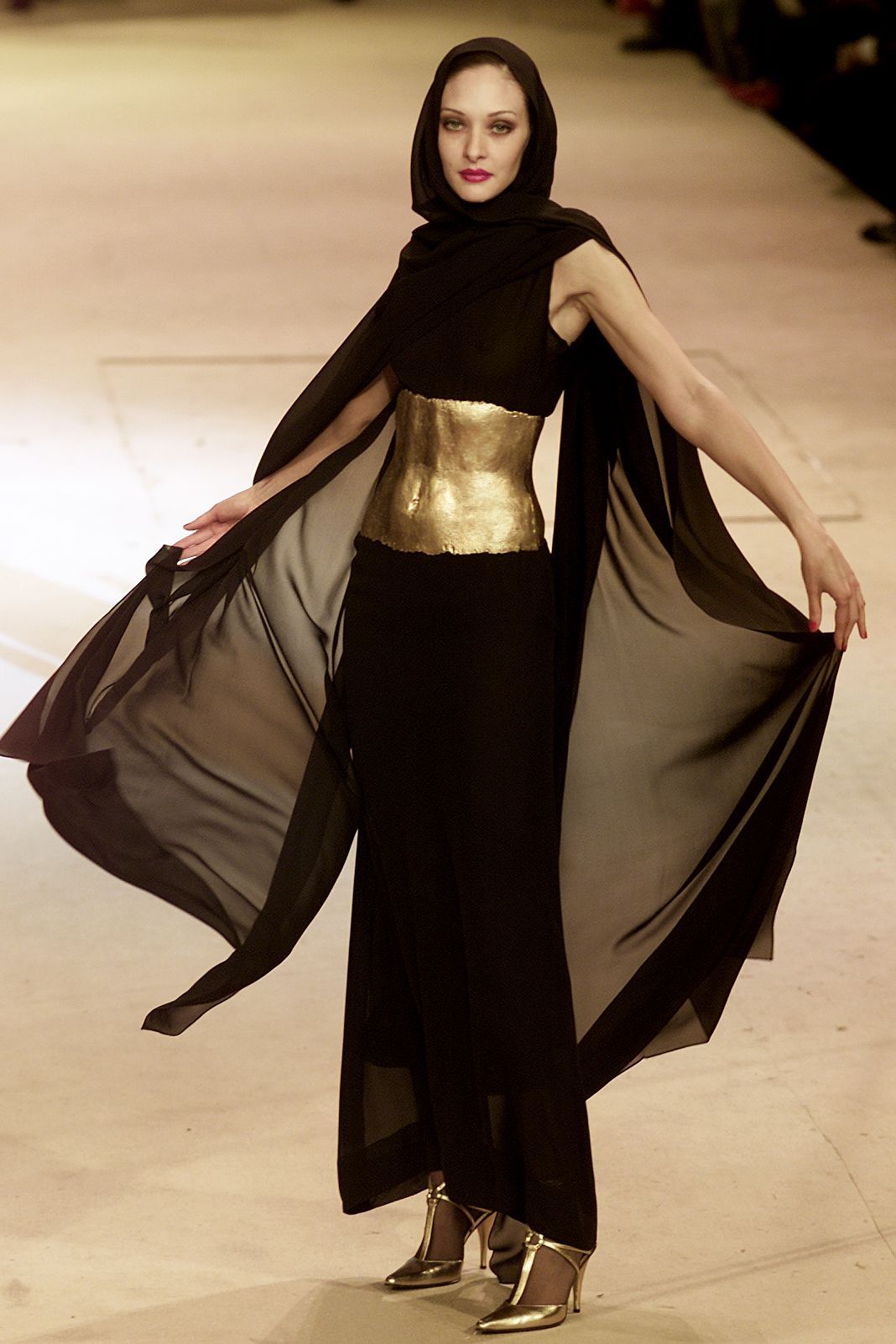 Image may contain clothing, clothing, fashion figures, cloaks and cloaks