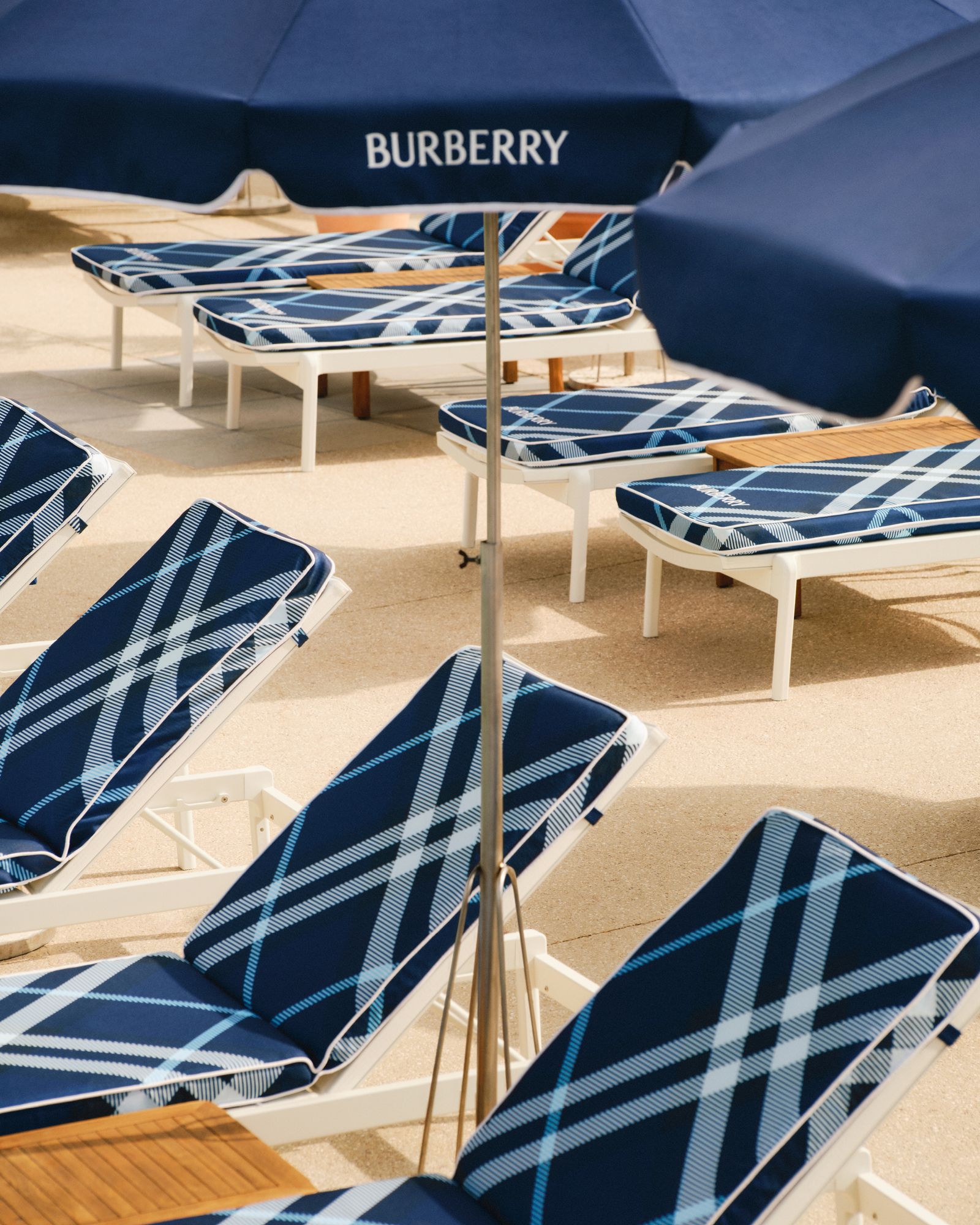 Pictures may contain furniture, canopy chairs and umbrellas