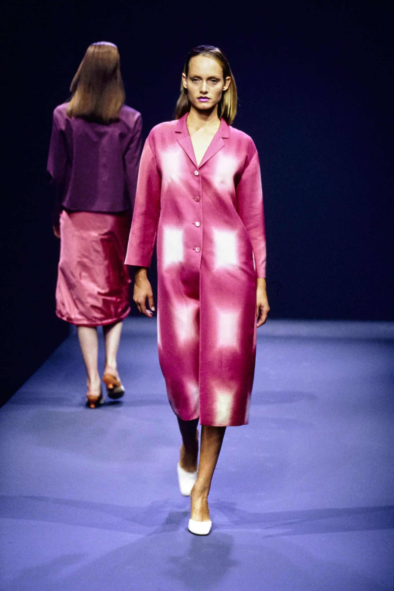Image may contain Amber Valletta Fashion Clothing Dresses Adult Coats Formal Wear and Suits