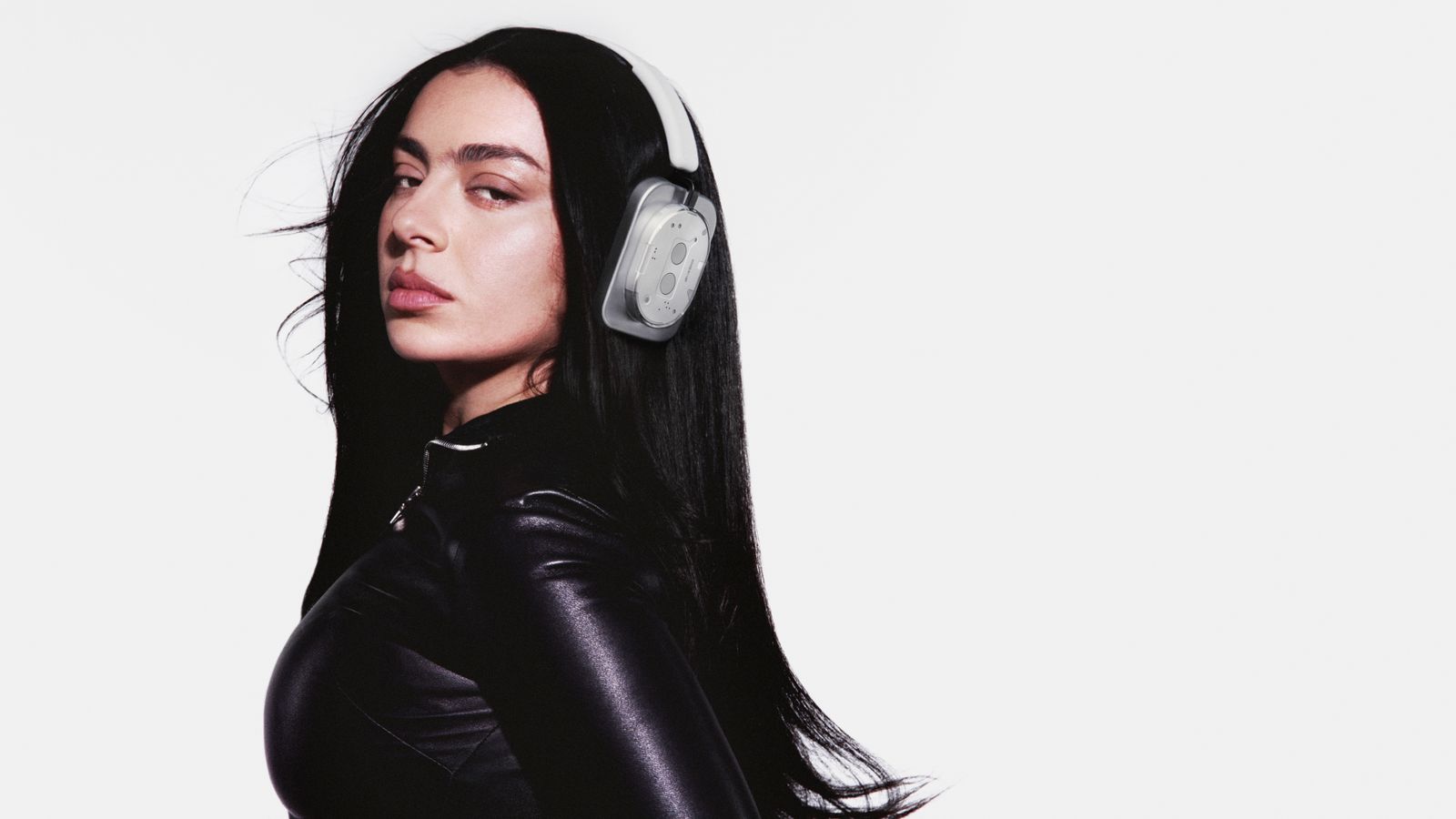 Image may contain Charli XCX adult electronic headsets and headphones