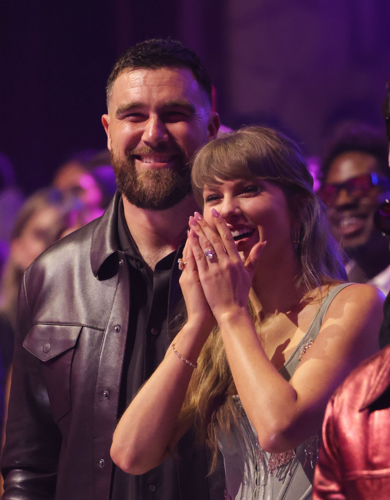 Image may contain Travis Kelce Taylor Swift Head Human Face Adult Happy Clothing and Outerwear