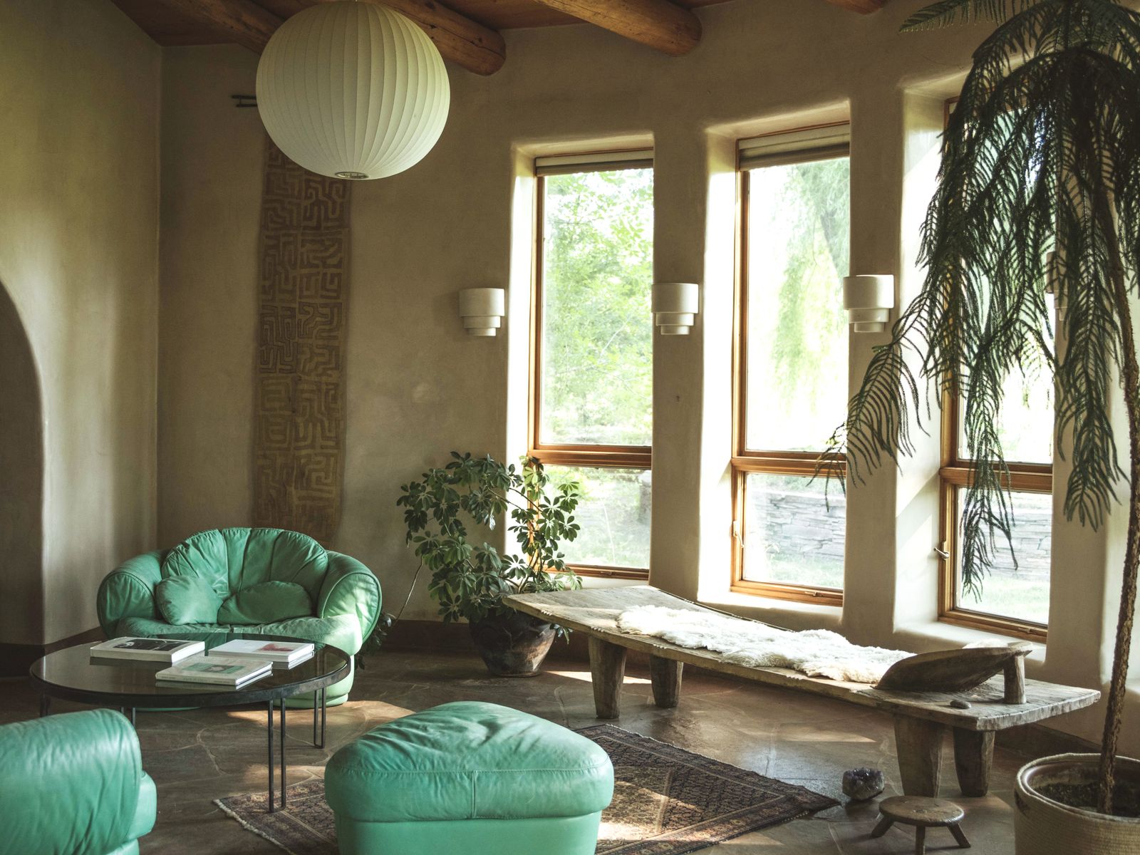 Images may contain plants, books, publications, furniture, lamps, windows and sofas